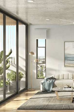 Modern living room with large glass doors and city view in Australia.